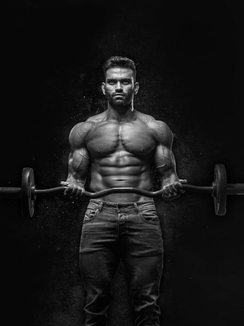 Male fitness training at gym as part of breakup recovery